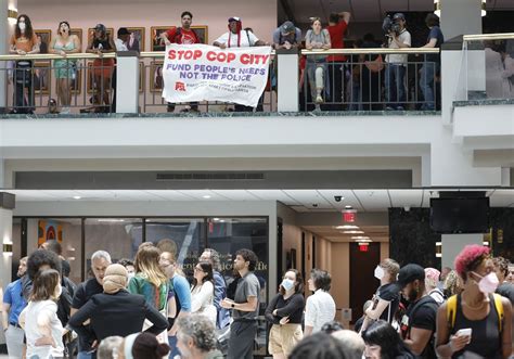 Atlanta council OKs funding construction of police and firefighter training center, decried as “Cop City” by activists